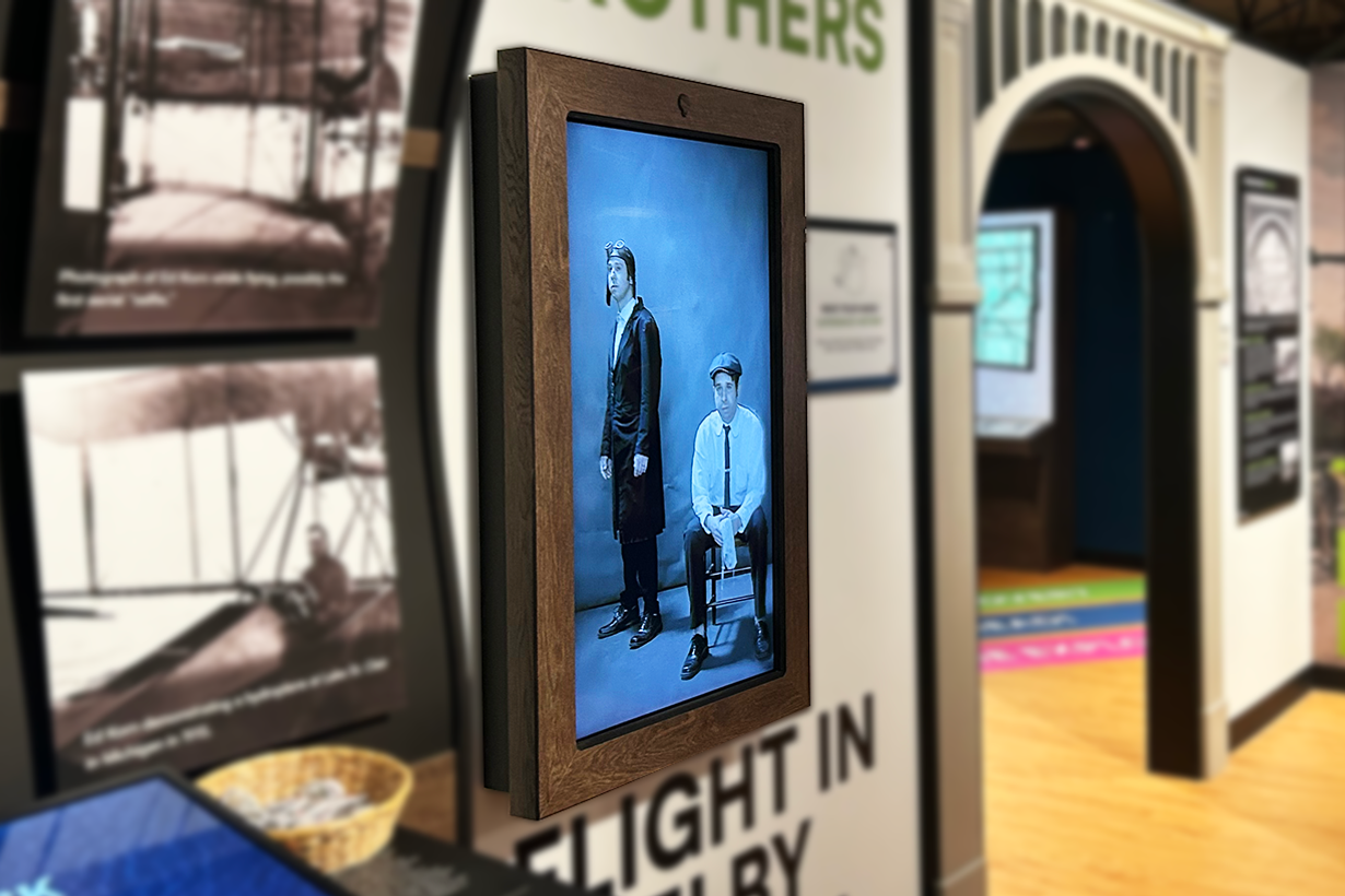Huge, motion sensor portraits spring to life and interact with guests as historical docents.
