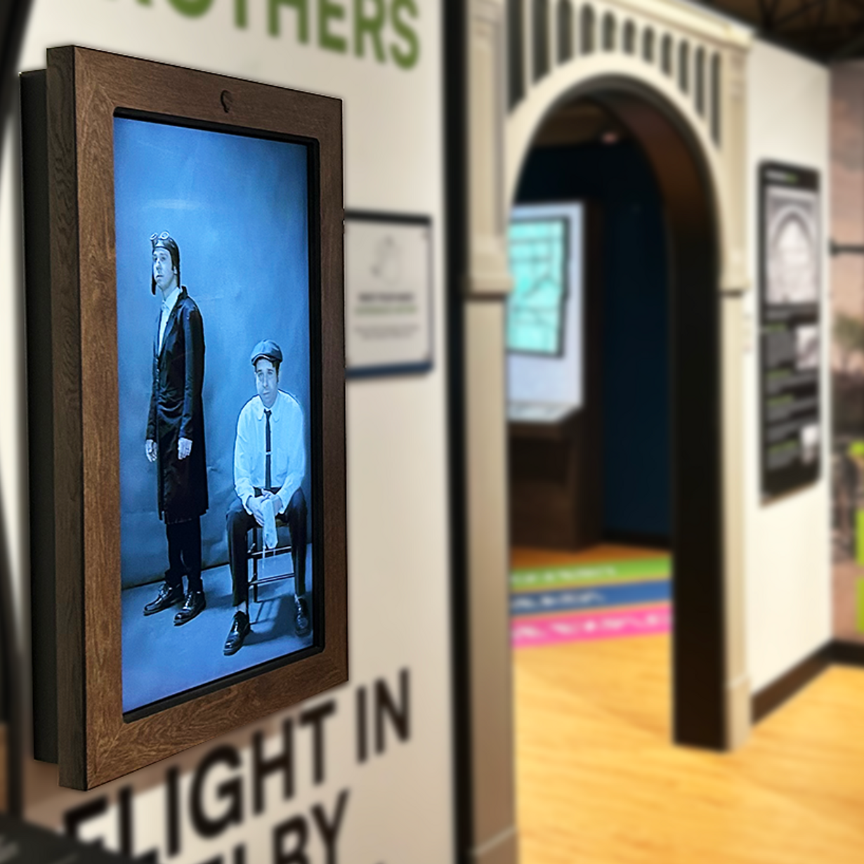 Huge, motion sensor portraits spring to life and interact with guests as historical docents.