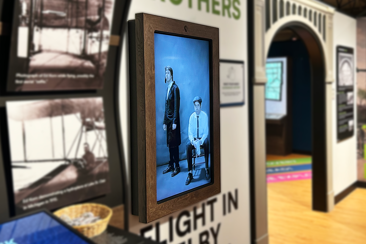 Huge, motion sensor portraits spring to life and interact with guests as historical docents.